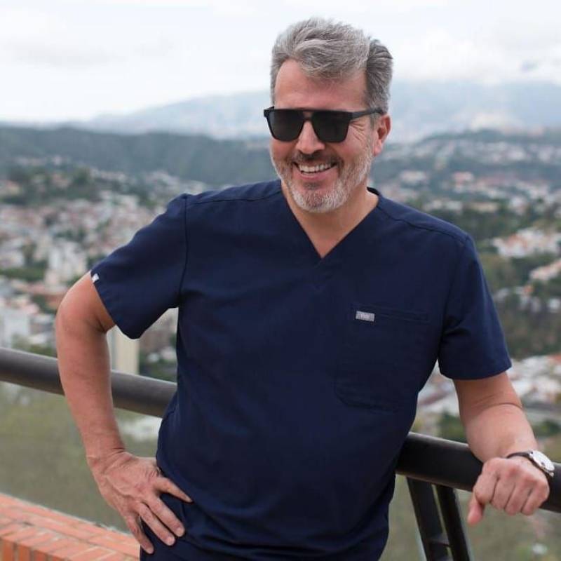 John daniel, 58, U A E